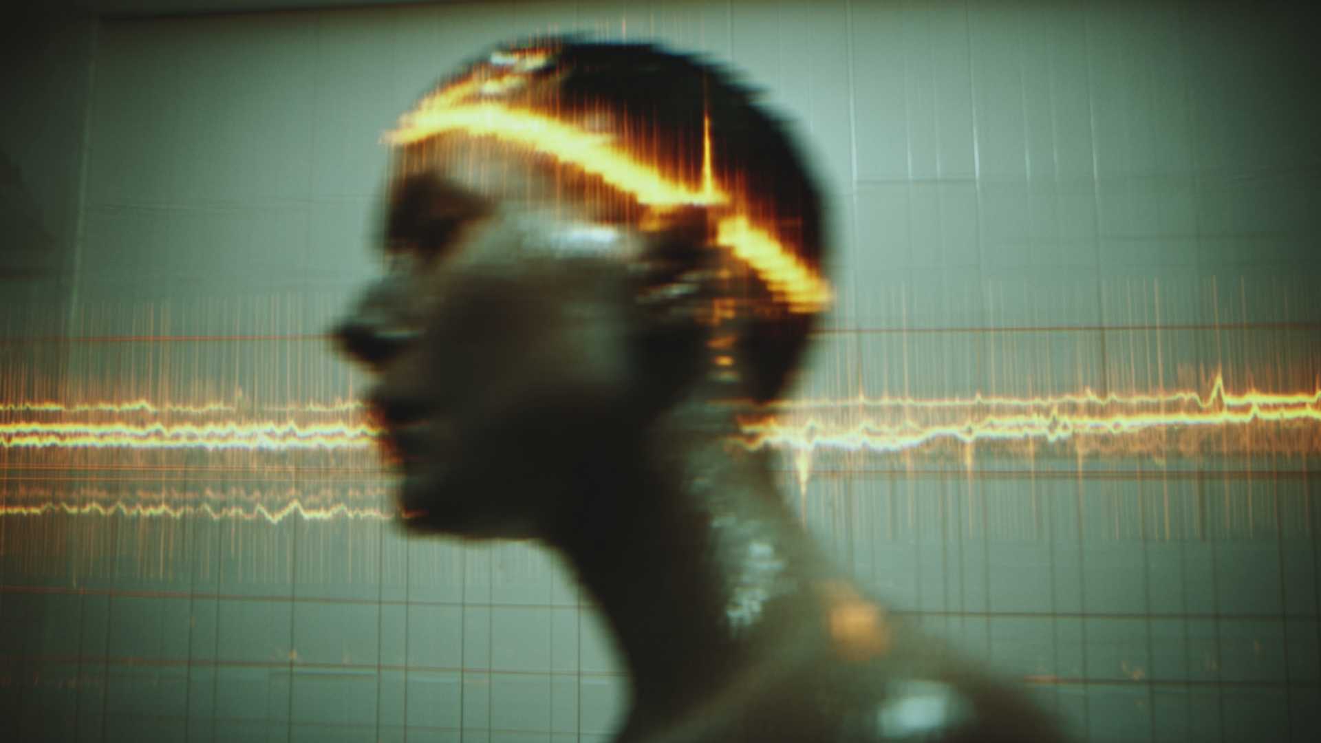High-angle canted shot of a BCI headband tracking brainwave data and cognitive load in real-time